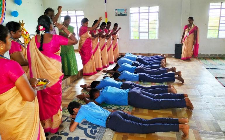 Students getting blessings from their teachers