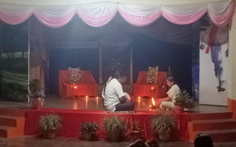 Giving Agnihotra ahuti