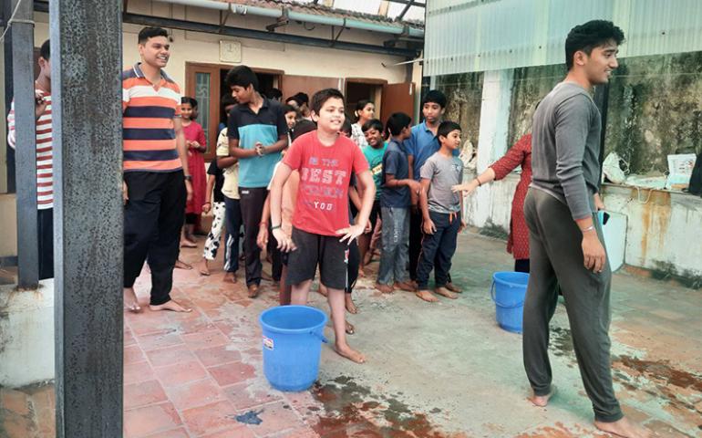 Children playing Water Race at Samskar Varga at Chennai