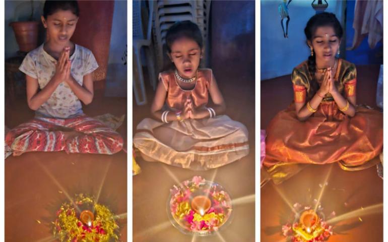 Students performing Deepavali Puja