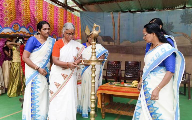 Lighting the lamp during Gita Jayanti at Thiruvananthapuram