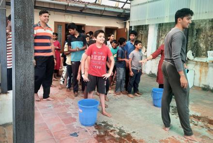 Children playing Water Race at Samskar Varga at Chennai